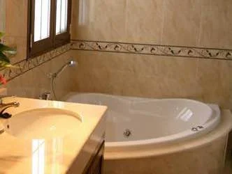 jacuzzi en la habitacion Hotel Casa Jardin