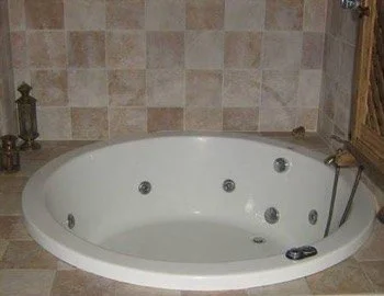 habitación con jacuzzi privado de la casa rural