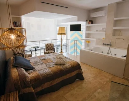 Interior de el Apartamento Dúplex donde tienes bañera de hidromasaje.