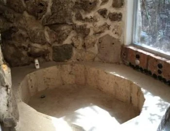El Apartamento con vistas al jardín con encanto y jacuzzi para enamorados.