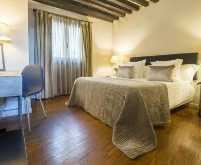 Una de las acogedoras habitaciones dobles de este hotel boutique.