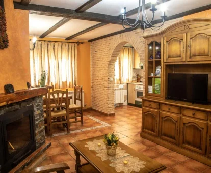 Interior de uno de los apartamentos de estilo rústico de este establecimiento.