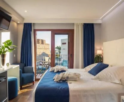 Una de las coquetas habitaciones dobles con balcón del hotel.