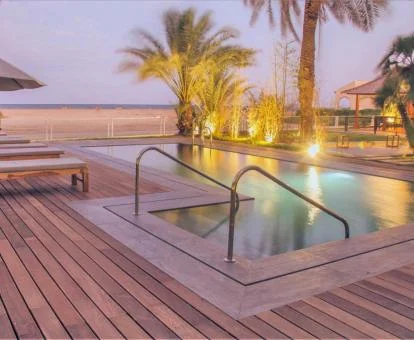 Zona exterior con piscina de este hotel romántico.