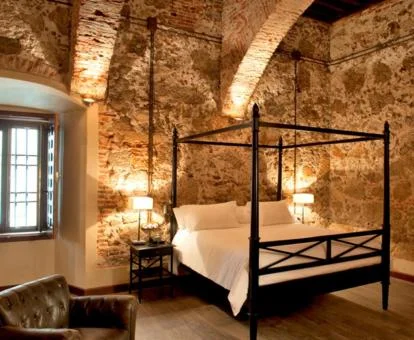 Una de las coquetas habitaciones de estilo tradicional del hotel.