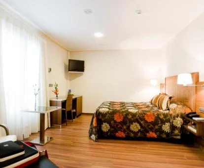 Una de las acogedoras habitaciones dobles de este elegante hotel boutique.