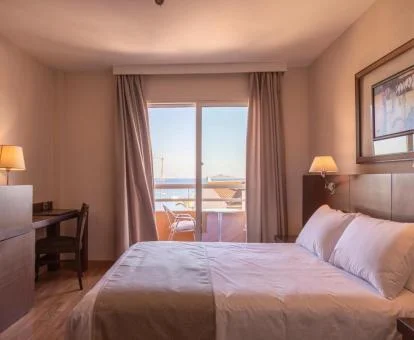 Una de las habitaciones con vistas al mar de este coqueto hotel.