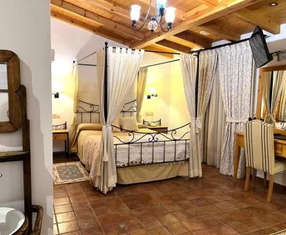 Una de las cómodas habitaciones de este acogedor establecimiento rural.