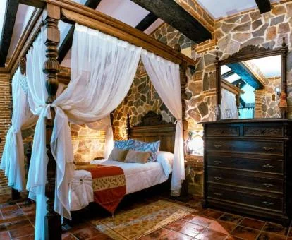 Una de las acogedoras habitaciones de estilo tradicional de este hotel rural.