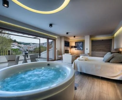 Una de las preciosas habitaciones con jacuzzi privado del alojamiento.