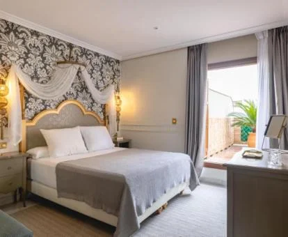 Una de las elegantes habitaciones dobles con terraza de este hotel boutique.
