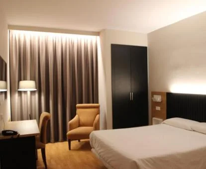Una de las elegantes habitaciones de este agradable hotel boutique urbano.