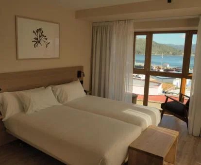 Una de las acogedoras habitaciones con vistas al mar del hotel.