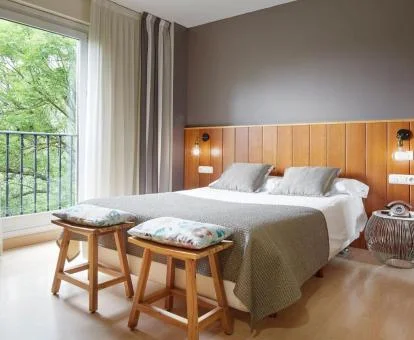 Una de las habitaciones con balcón de este hotel boutique.