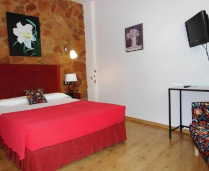 Una de las acogedoras habitaciones dobles de este acogedor hotel rural.