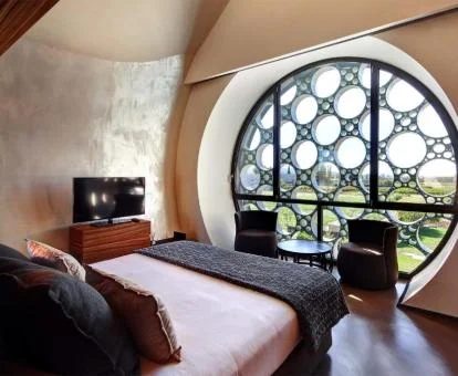 Una de las elegantes habitaciones de este precioso hotel para amantes de la cultura vinícola.