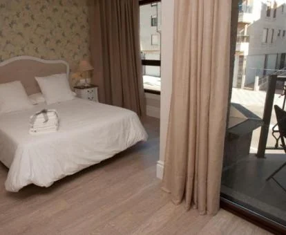 Una de las elegantes habitaciones dobles con terraza de este hotel boutique.