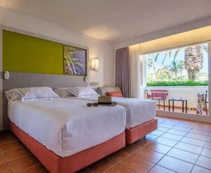 Una de las coquetas habitaciones dobles con terraza de este coqueto hotel.