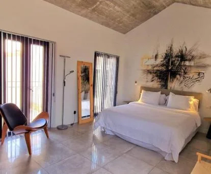 Una de las amplias habitaciones de este coqueto hotel boutique.