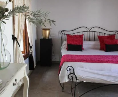 Una de las hermosas habitaciones de estilo tradicional del hotel.