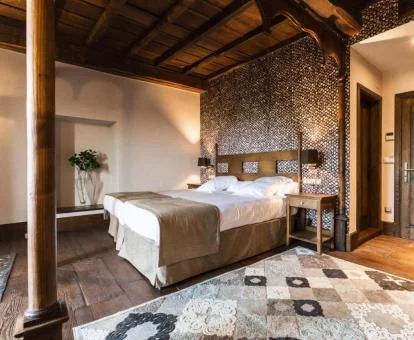 Una de las acogedoras habitaciones de estilo tradicional del hotel.