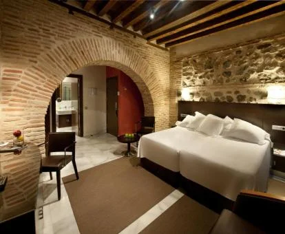 Una de las hermosas habitaciones con elementos originales de este hotel boutique.