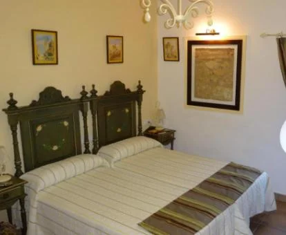 Una de las coquetas habitaciones de estilo tradicional de este hotel boutique.