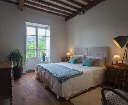 Una de las elegantes habitaciones dobles de este hotel boutique tradicional.