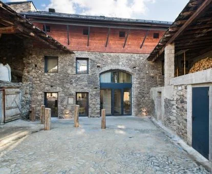Establecimiento rural solo para adultos con edificios de piedra.