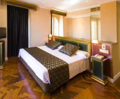 Una de las amplias habitaciones de estilo tradicional del hotel.