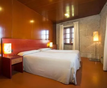 Una de las acogedoras habitaciones de estilo tradicional de este hotel rural.